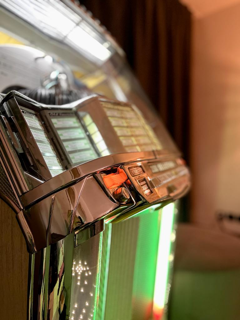 Wurlitzer Centennial jukebox selection panel and chrome details